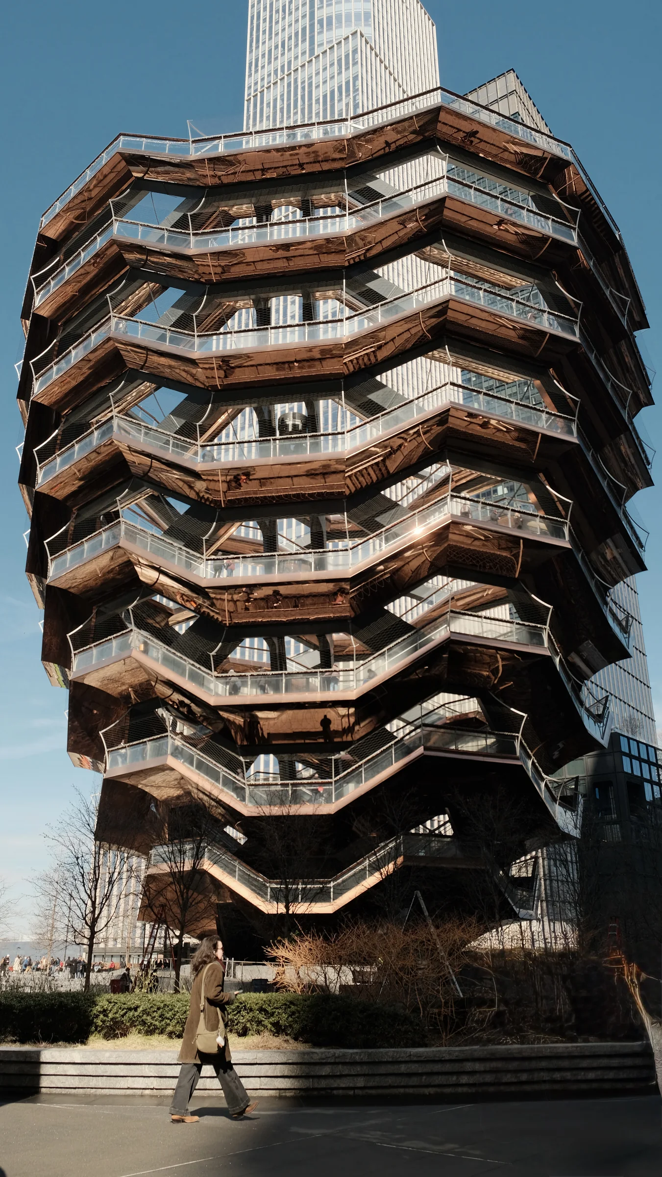 The Vessel at Hudson Yards with a pedestrian in front