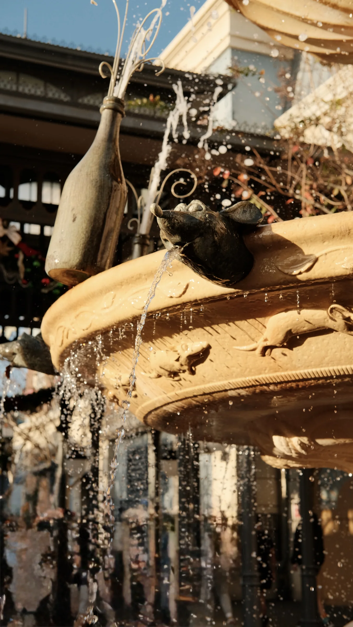Warm fountain detail with water droplets